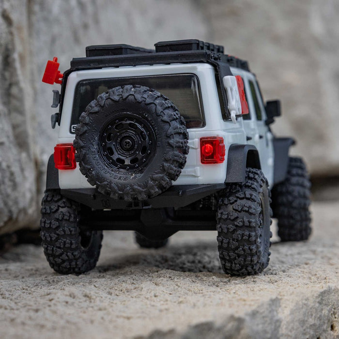 Axial AXI-2261T2 SCX30 Jeep Wrangler JLU 4X4 RTR Brushed Rock Crawler (Battery & Charger Included), White